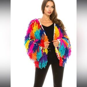 Lala brand crochet rainbow sweater.